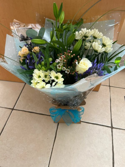 New wonder - A stunning mix of purple and white flowers makes this the perfect gift to impress