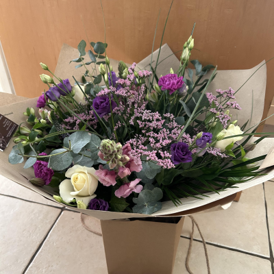Cool Breeze - This classical stylish collection of flowers, make this hand tied the perfect gift. Flowers professionally arranged and delivered by a local florist.